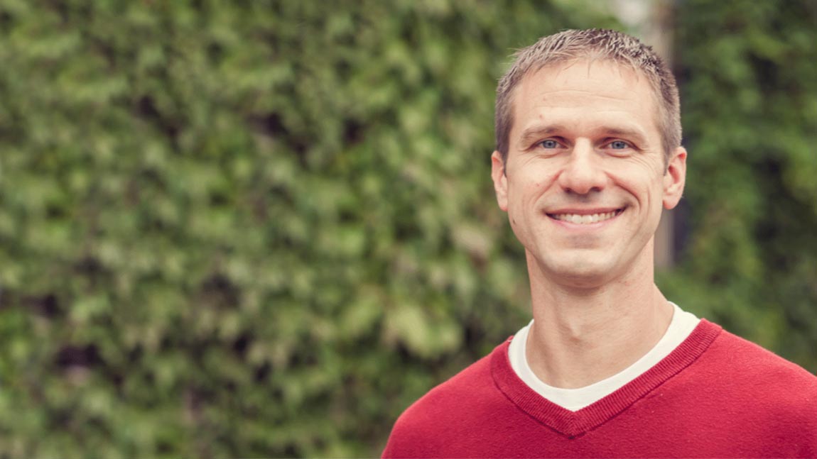 A man smiling at the camera.